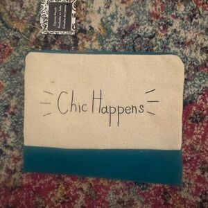 Chic happens makeup bag. Never used.